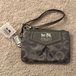 Grey mini coach wristlet